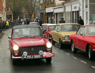 A frantic wave from Fergus as they shot past.