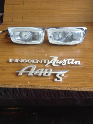 New Old Stock Innocenti front sidelights, ( which were boxed ), and Austin Innocenti badge. The A40S badge i bought some time ago.